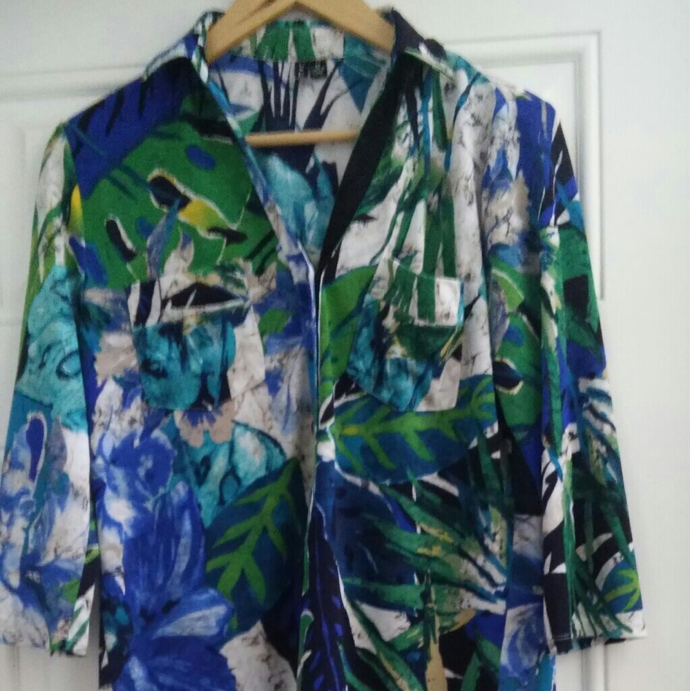 Blue, green, black and white blouse